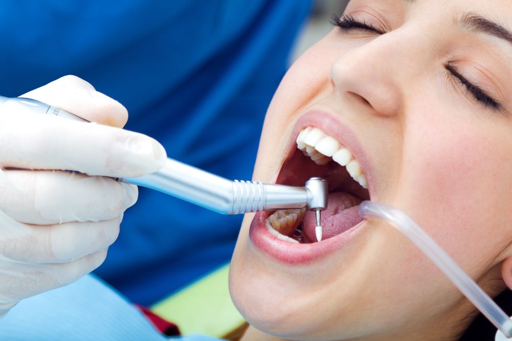 is dental extraction painful procedure risks and recovery